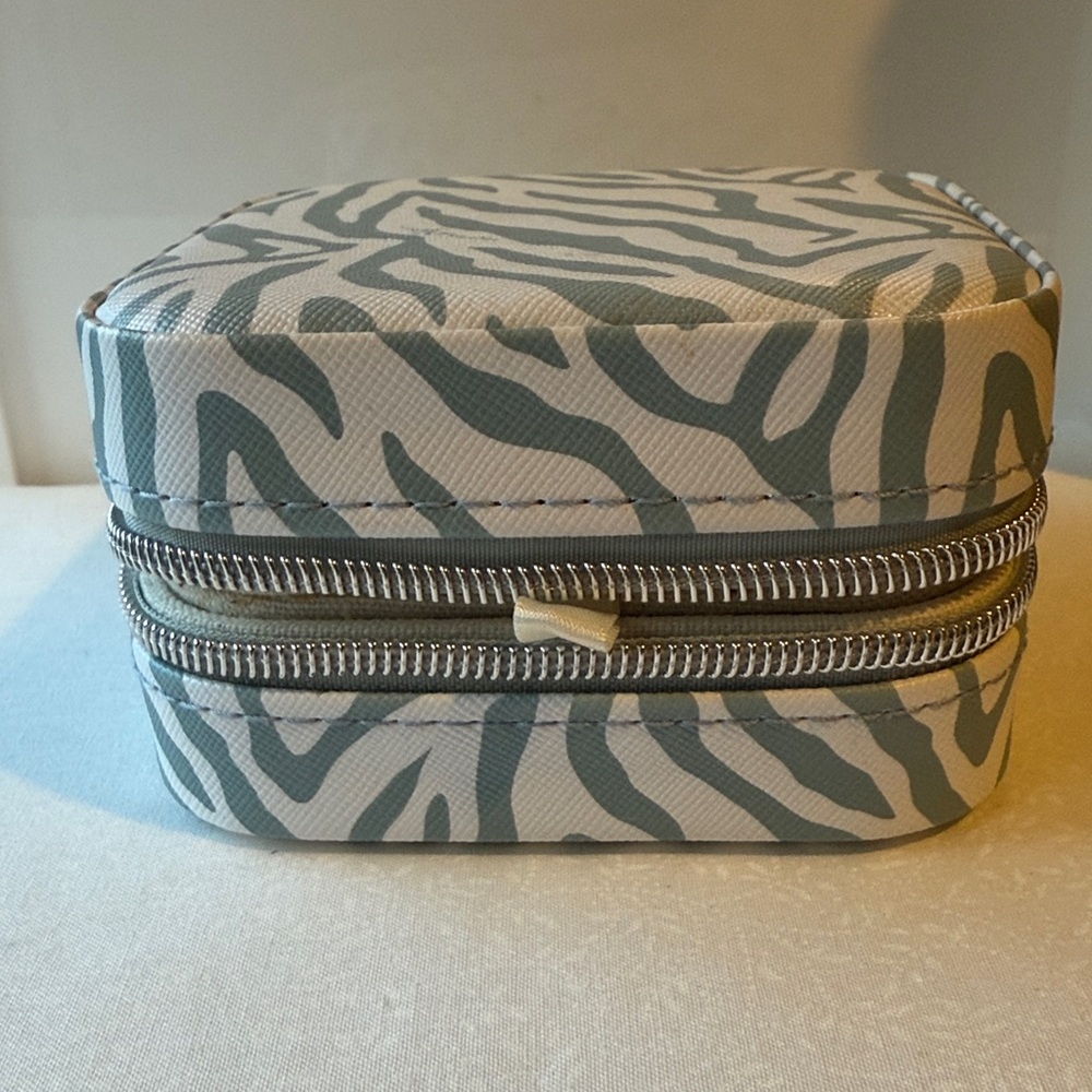 Milly Zebraโ Print Jewelry Case - Gray and White